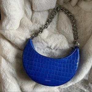 Blue faux croc half moon bag with silver hardware